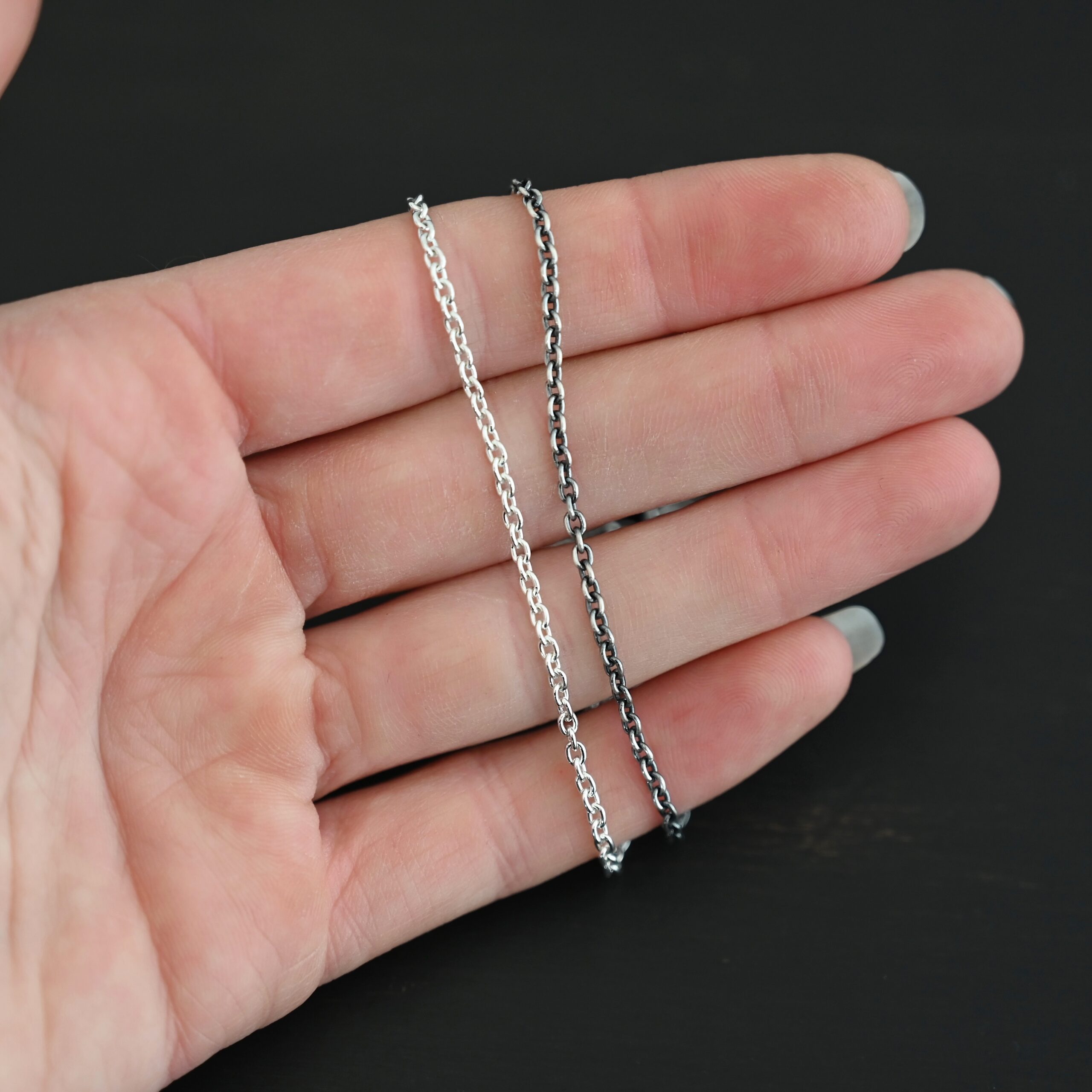 Savannah Chain Savannah Chain oxidized & shiny shown in hand