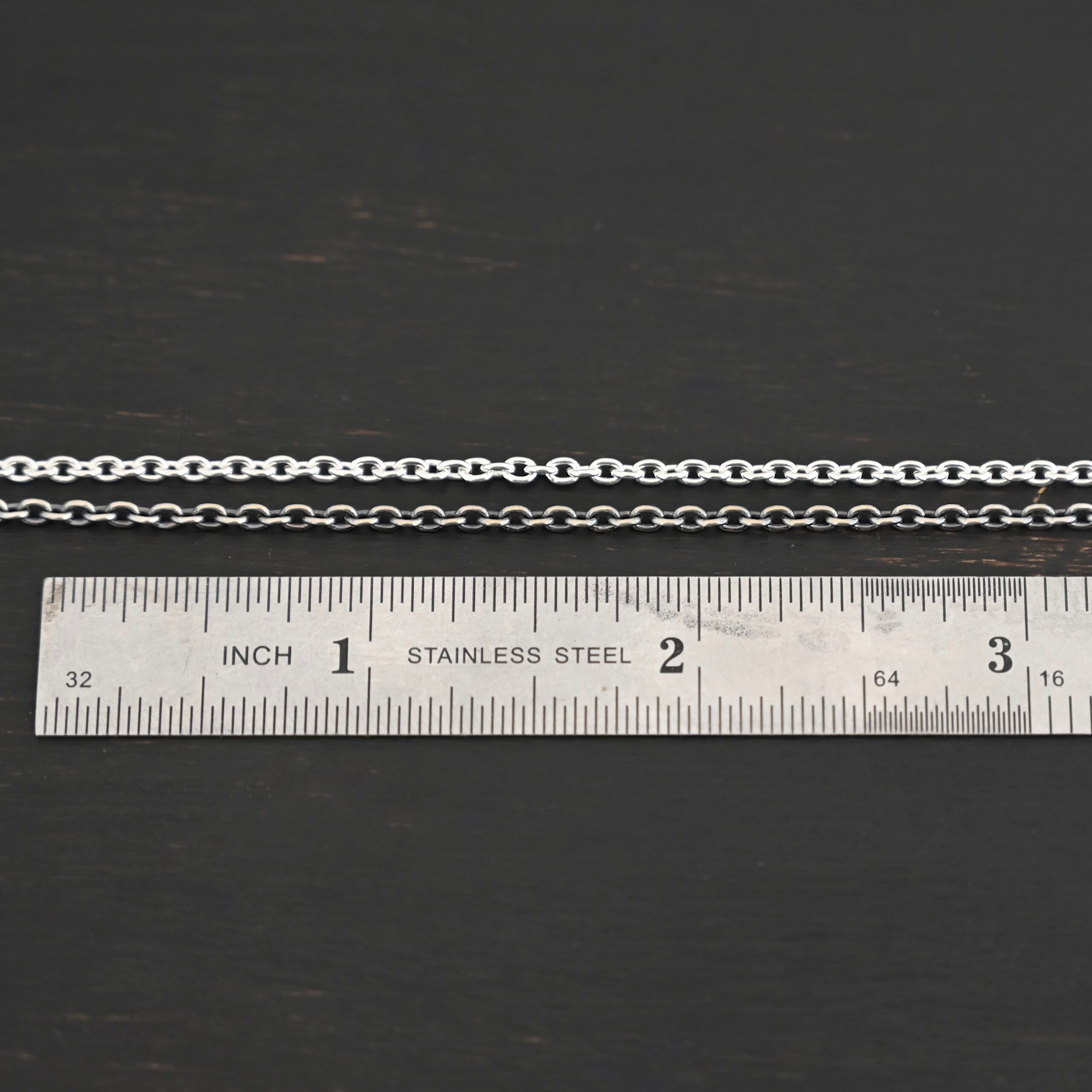Savannah Chain Savannah Chain oxidized & shiny shown by ruler