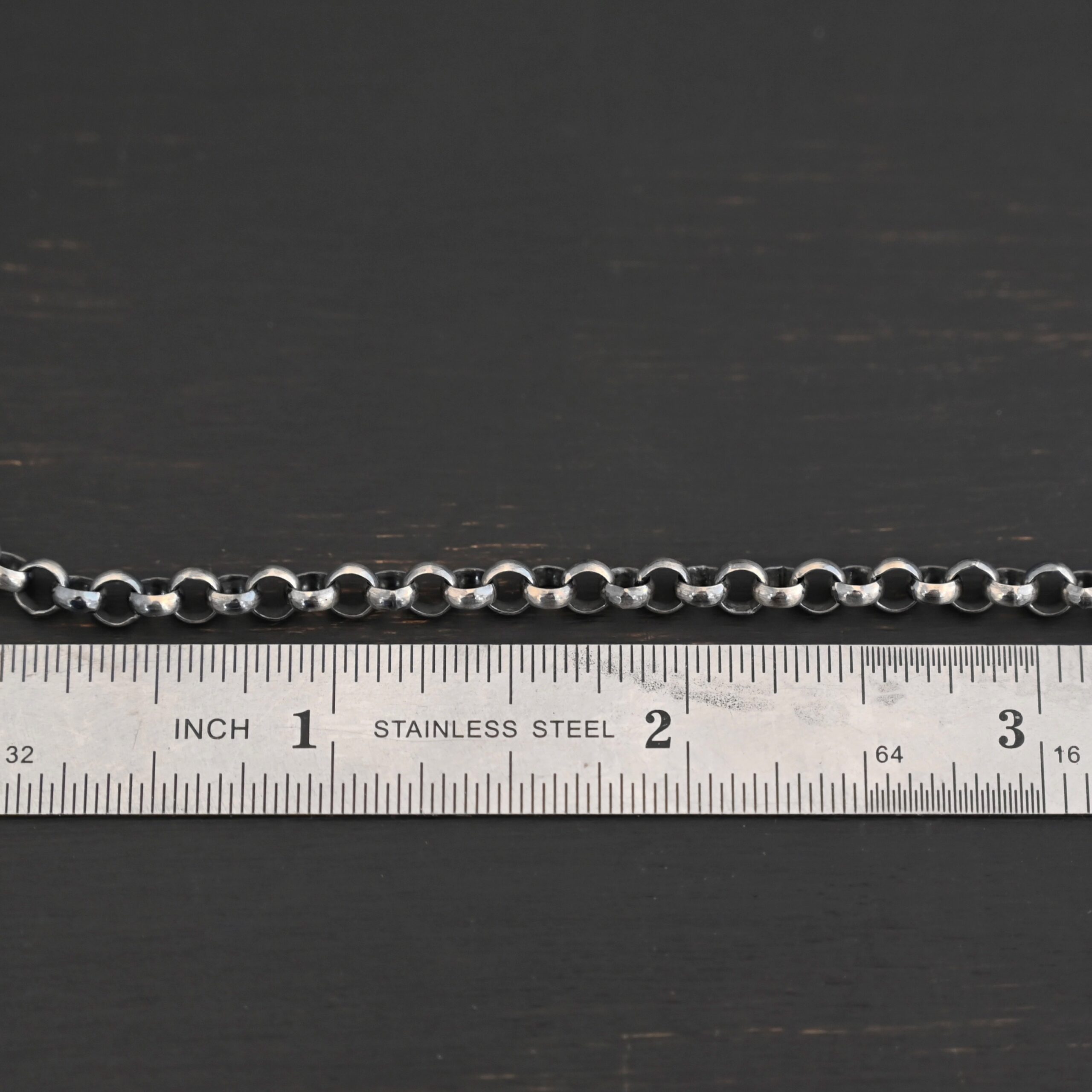 Roxy Rolo Chain oxidized shown by ruler