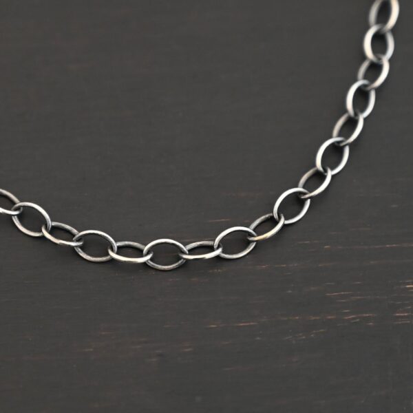 Willow Chain oxidized shown on dark background