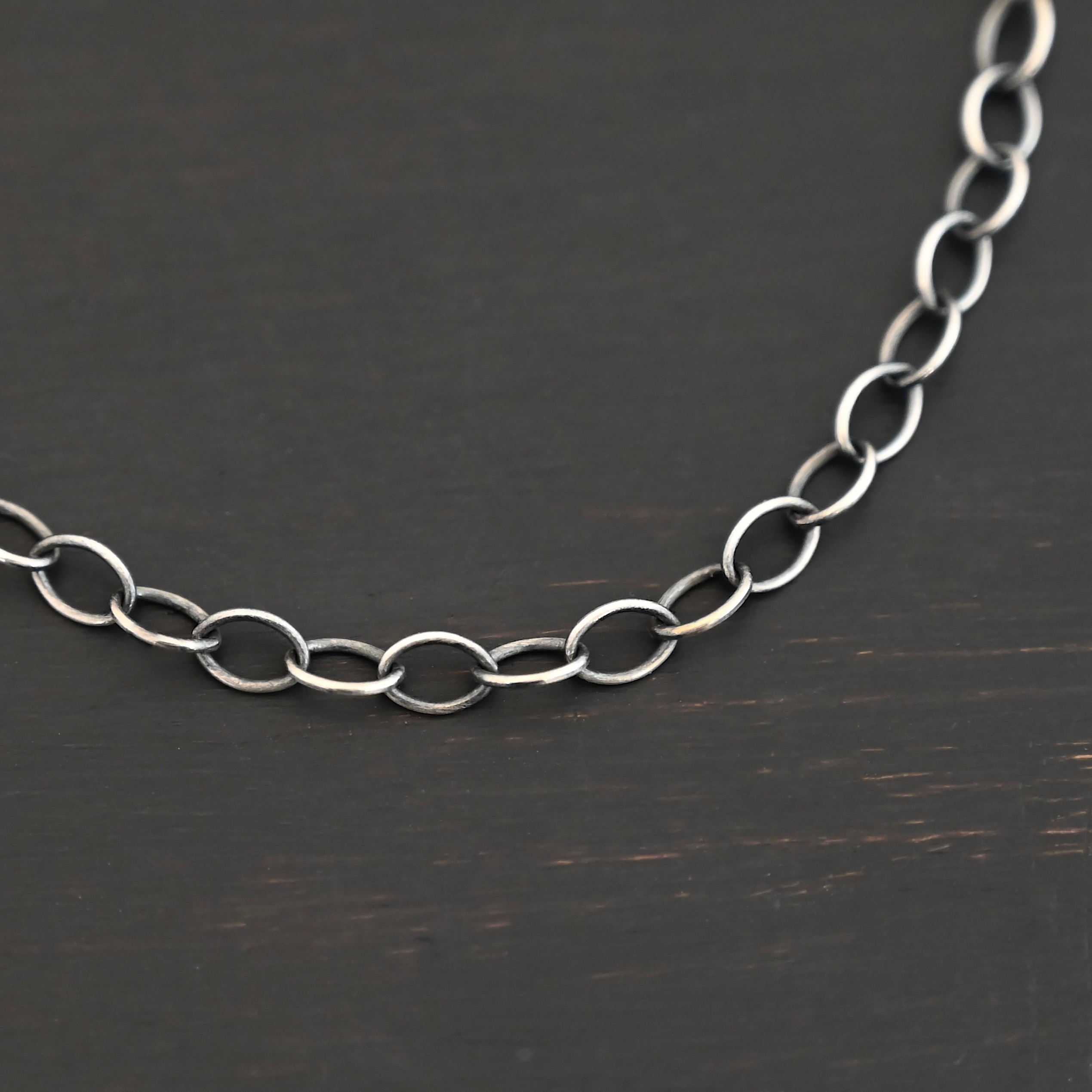 Willow Chain oxidized shown on dark background