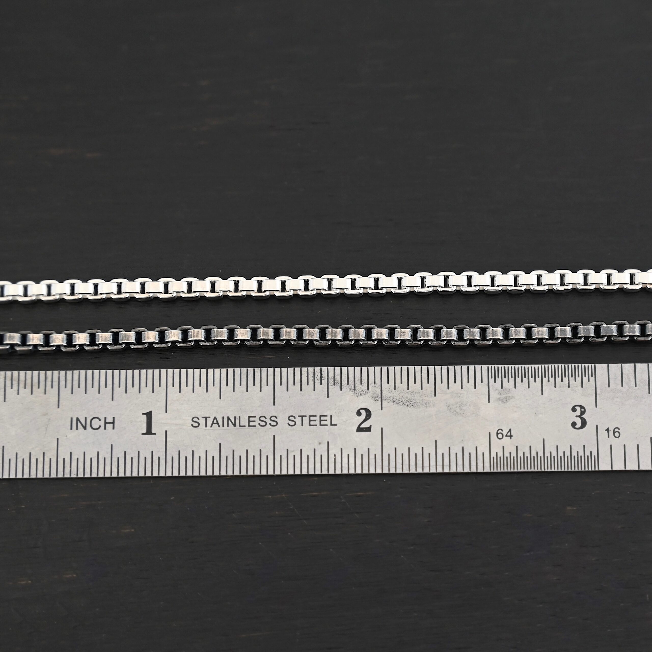 Sterling Silver Briggs Box Chain - shiny & oxidized shown by ruler