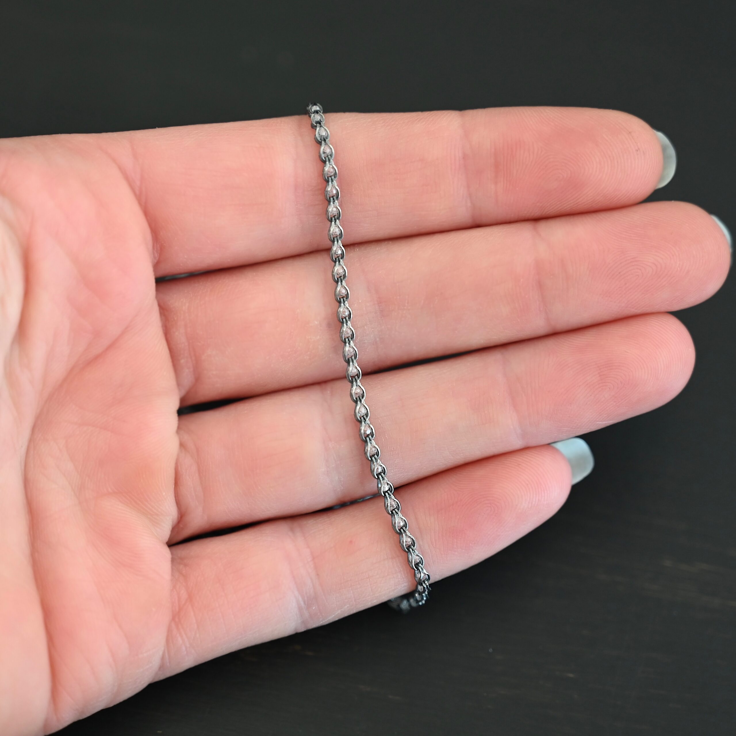 Sterling Silver Scarlett - oxidized shown in hand