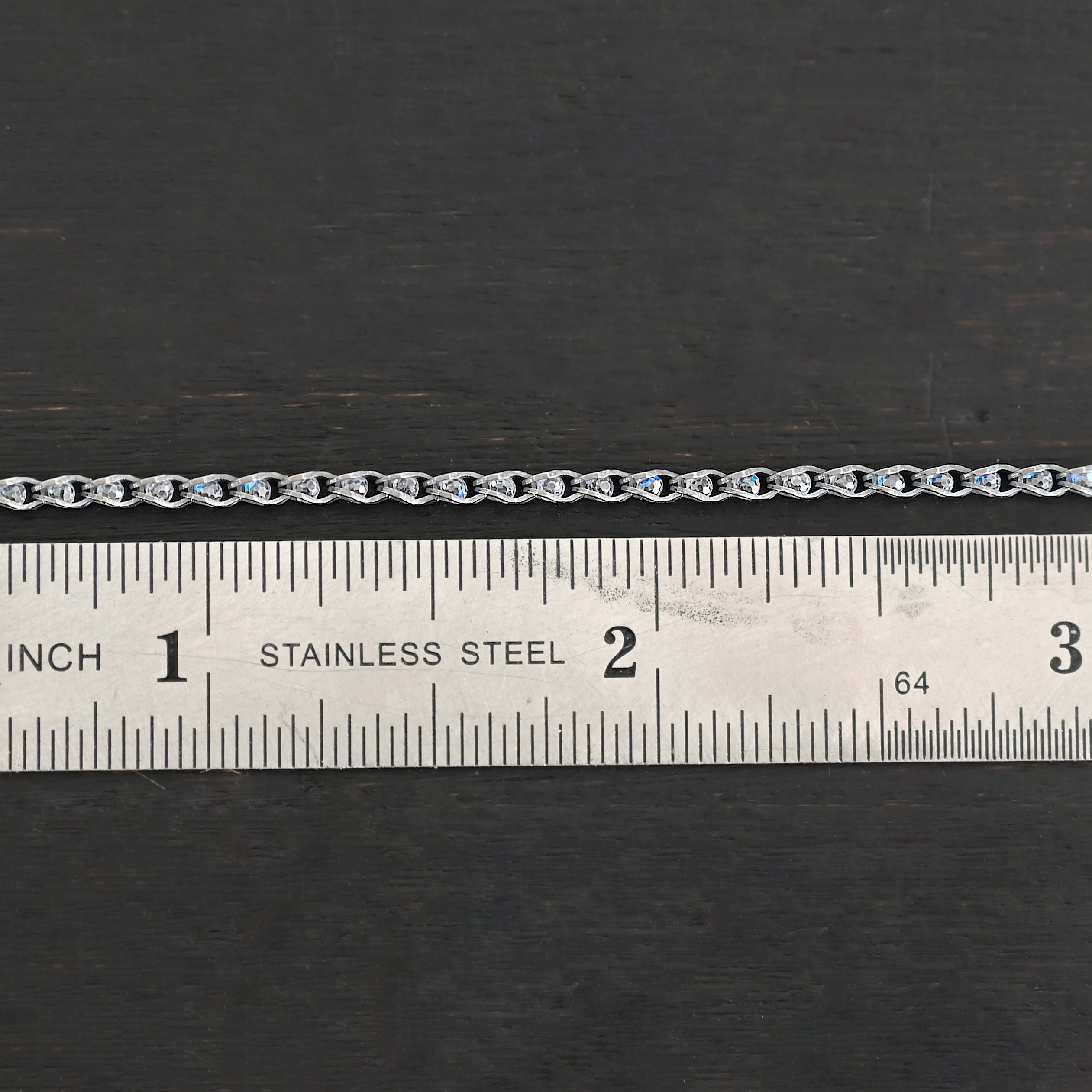 Sterling Silver Scarlett - oxidized shown by ruler