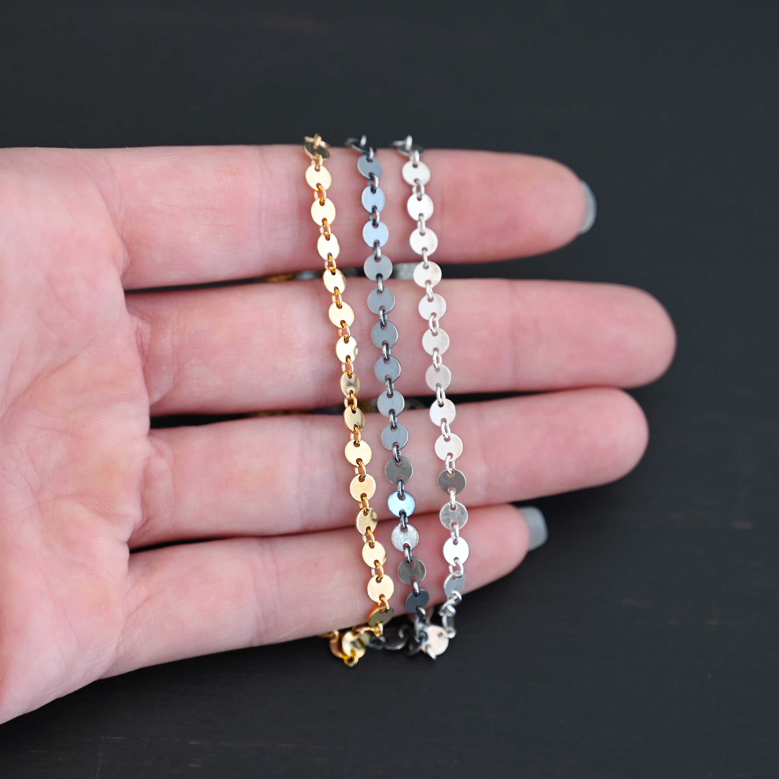 Gypsy Coin Chain - shiny sterling silver, oxidized sterling silver, & 14k gold filled - shown in hand