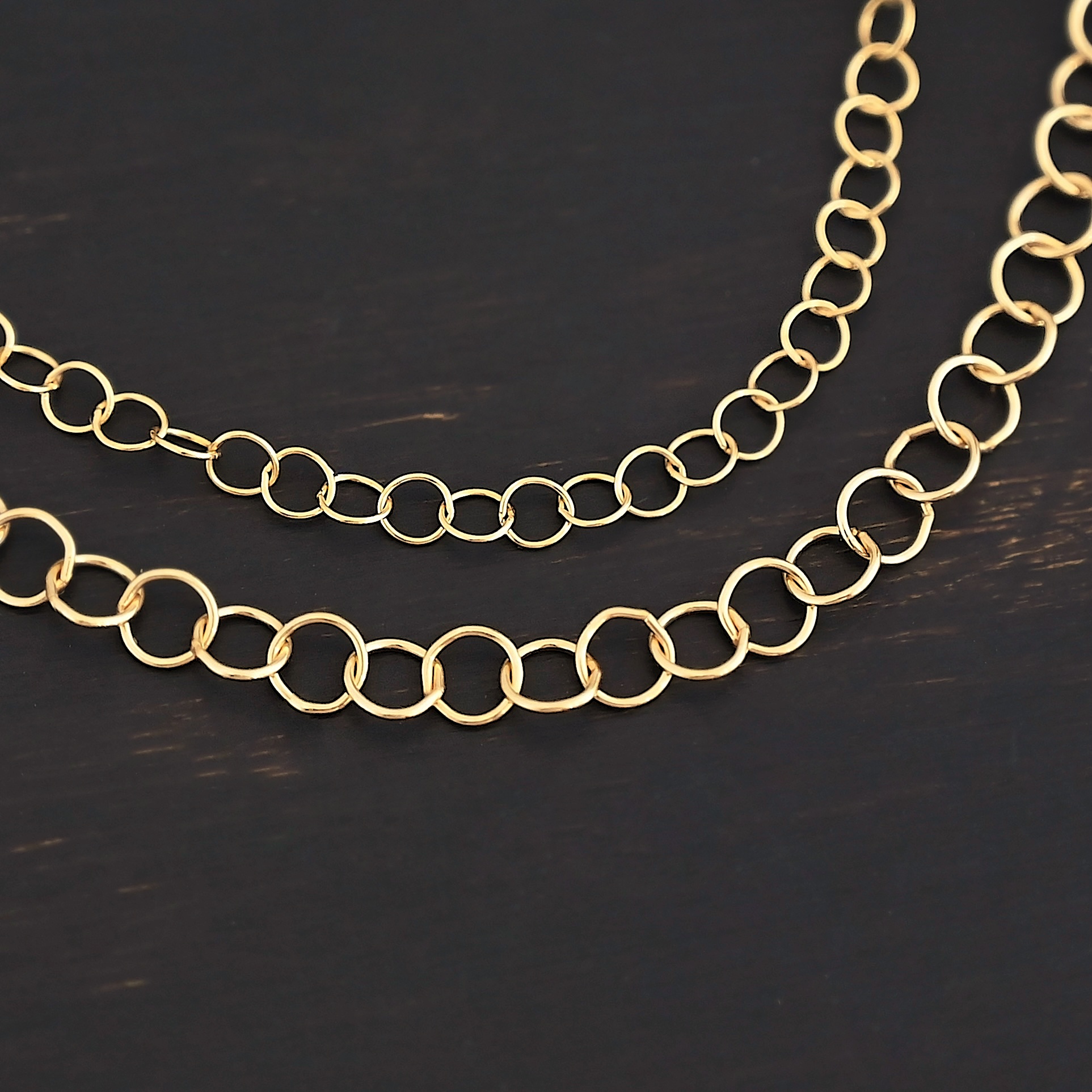 14k Gold Filled Round Extension 3.5mm and 5mm shown on dark background