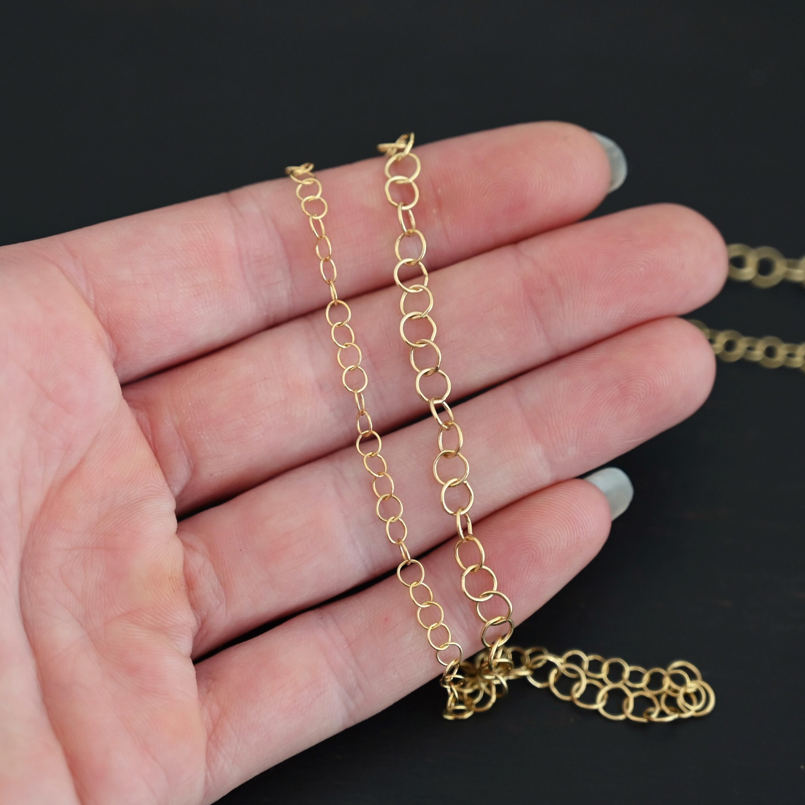 14k Gold Filled Round Extension 3.5mm & 5mm shown in hand