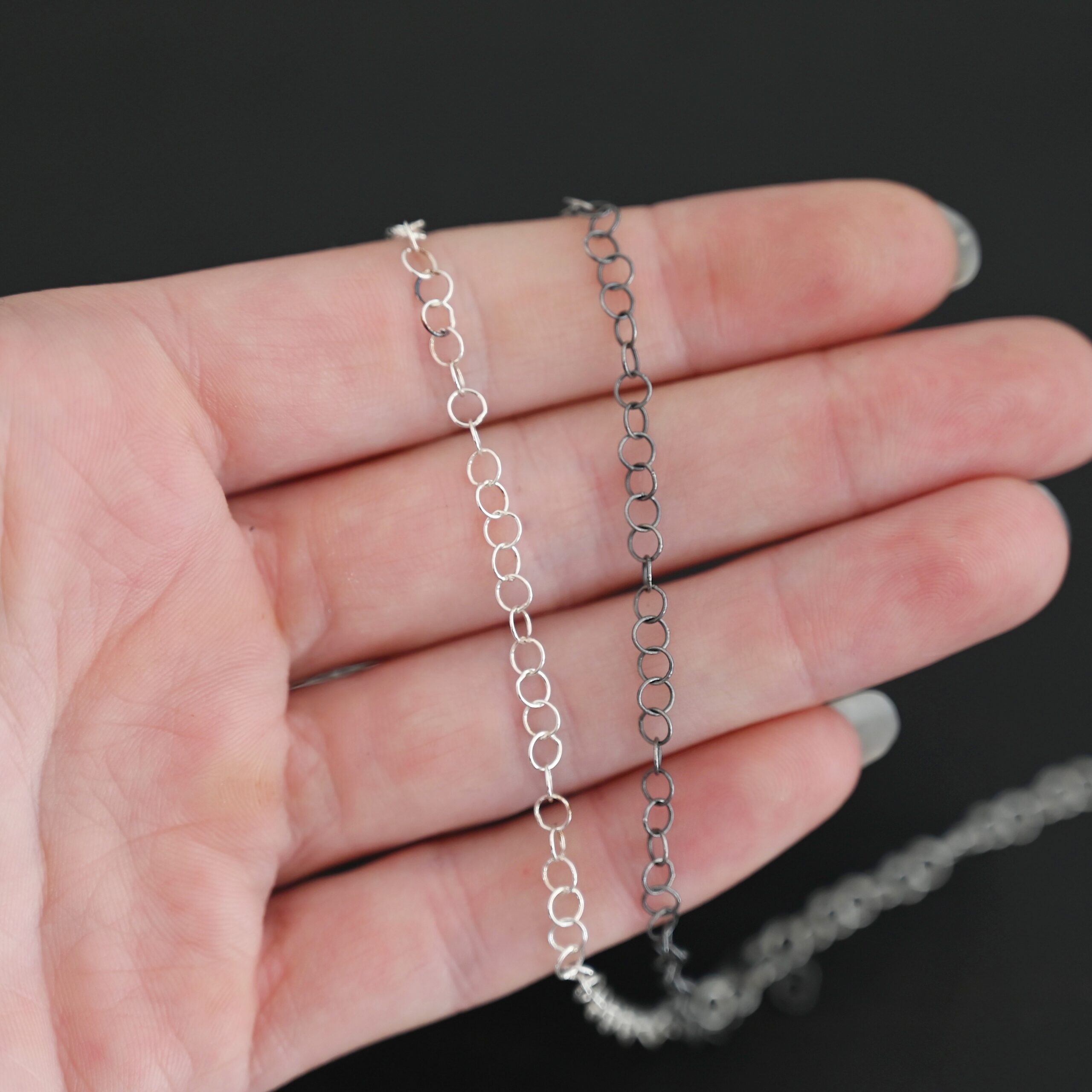 Sterling Silver Round Extension 3.5mm shiny and oxidized shown in hand