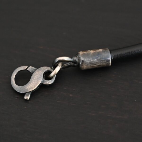 Wren Wire Necklace Oxidized shown on dark background