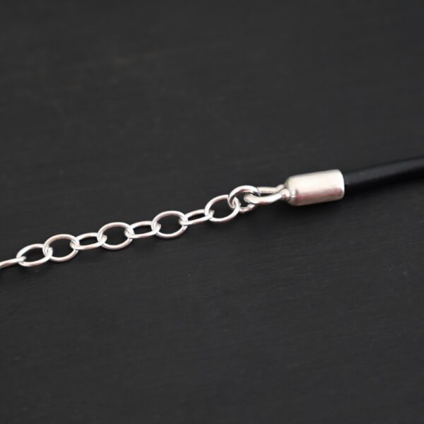 Wren Wire Necklace Shiny shown on dark background