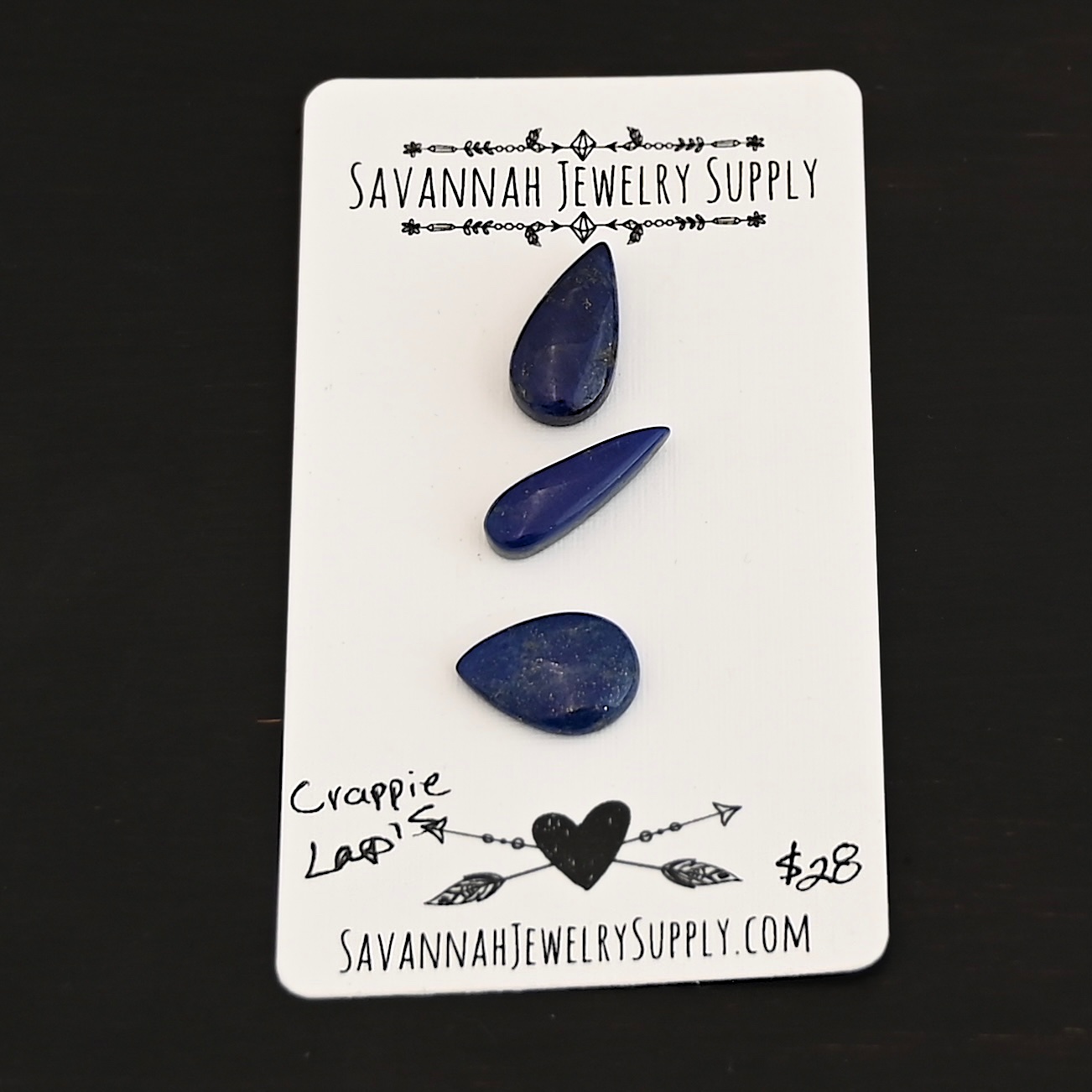 Crappie Lapis cabochon parcel shown on business card