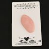 Fuzzy Navel Pink Opal cabochon parcel shown on business card