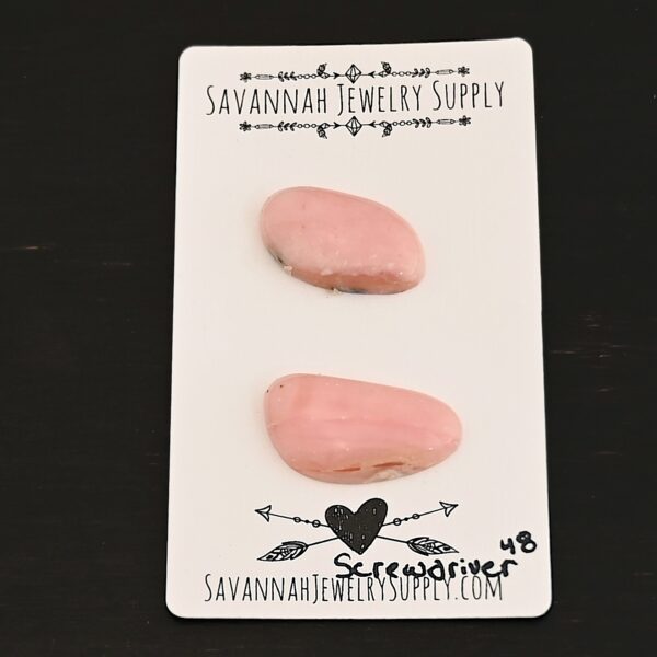 Screwdriver Pink Opal cabochon parcel shown on business card