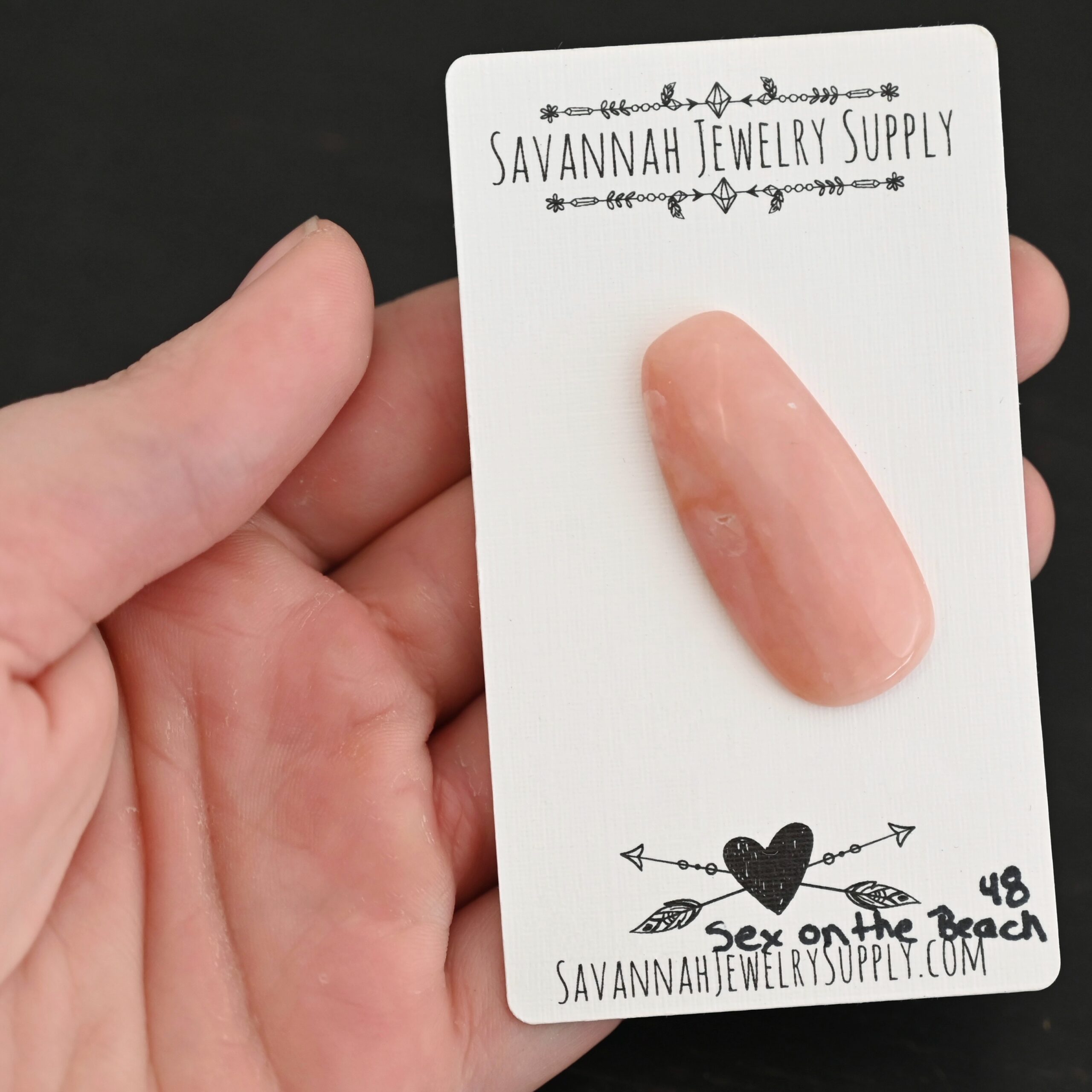 Sex on the Beach Pink Opal cabochon parcel Sex on the Beach Pink Opal cabochon parcel shown in hand