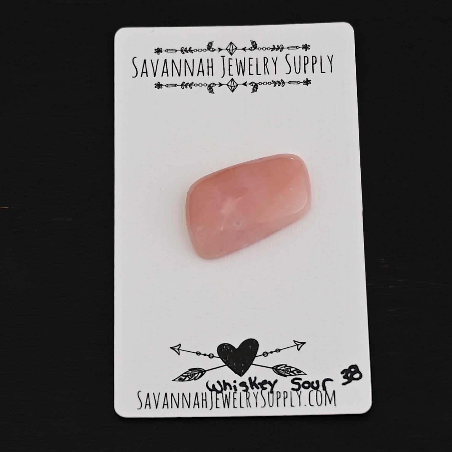 Whiskey Sour Pink Opal cabochon parcel Whiskey Sour Pink Opal cabochon parcel shown on business card