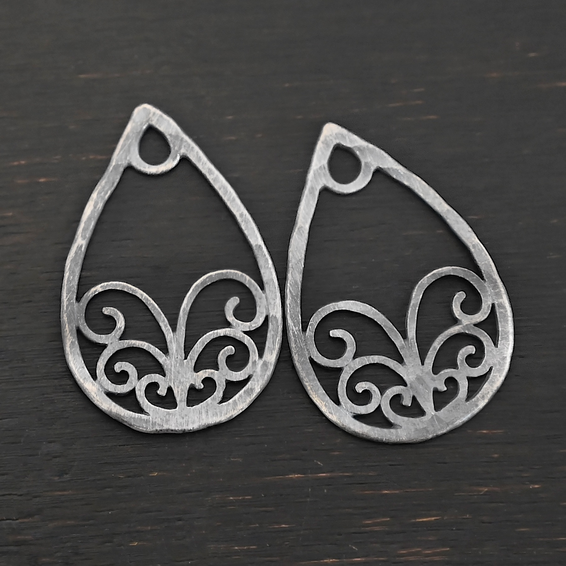 Sterling Silver Tiana Ornate Teardrop Chandelier - oxidized hammered shown on dark background