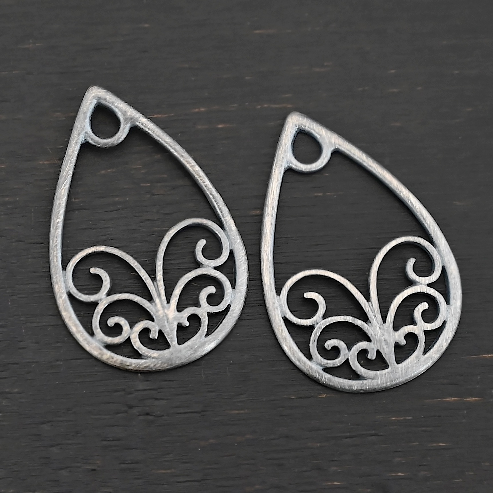 Sterling Silver Tiana Ornate Teardrop Chandelier - oxidized smooth shown on dark background