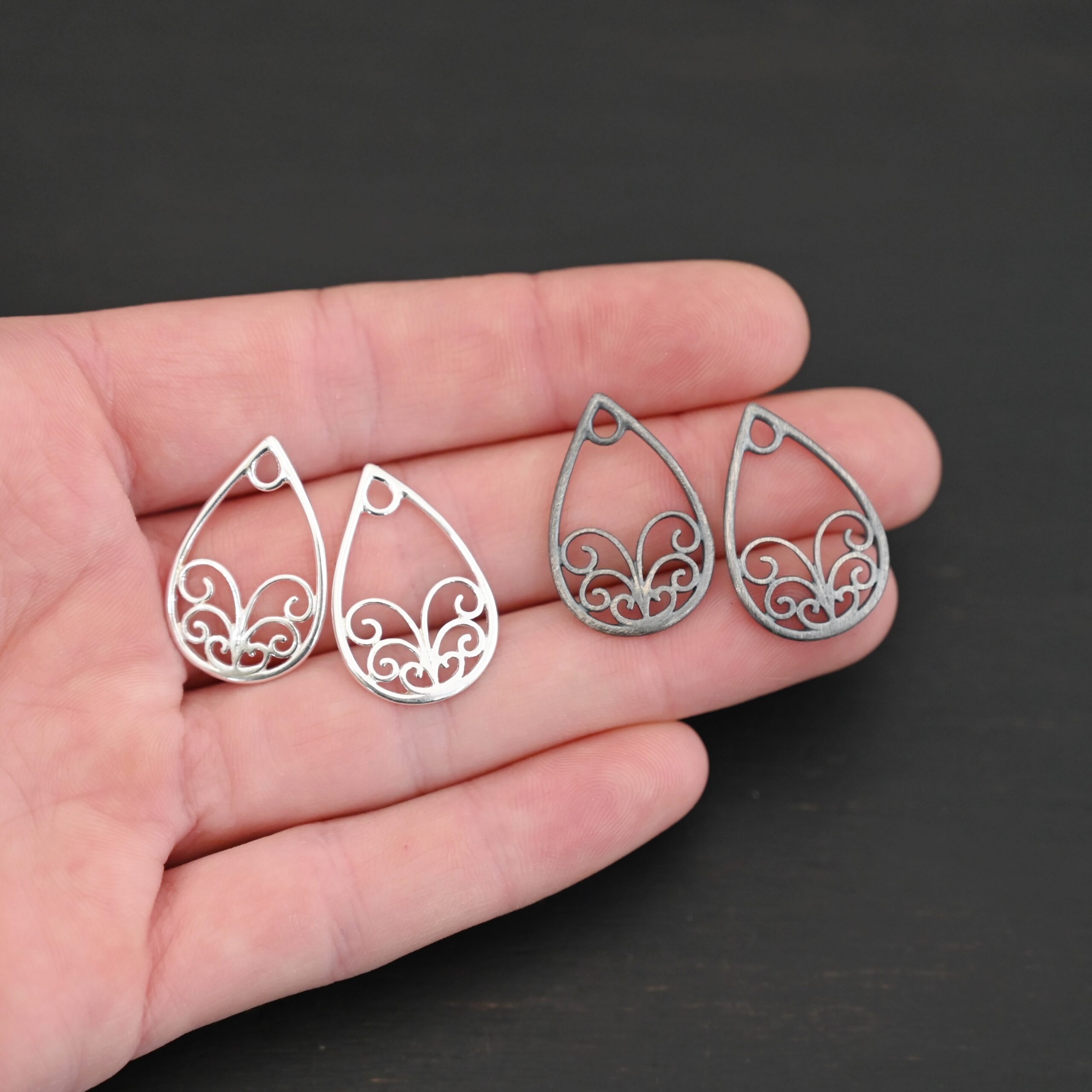 Sterling Silver Tiana Ornate Teardrop Chandelier - smooth shown in hand