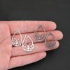 Sterling Silver Tiana Ornate Teardrop Chandelier - hammered shown in hand