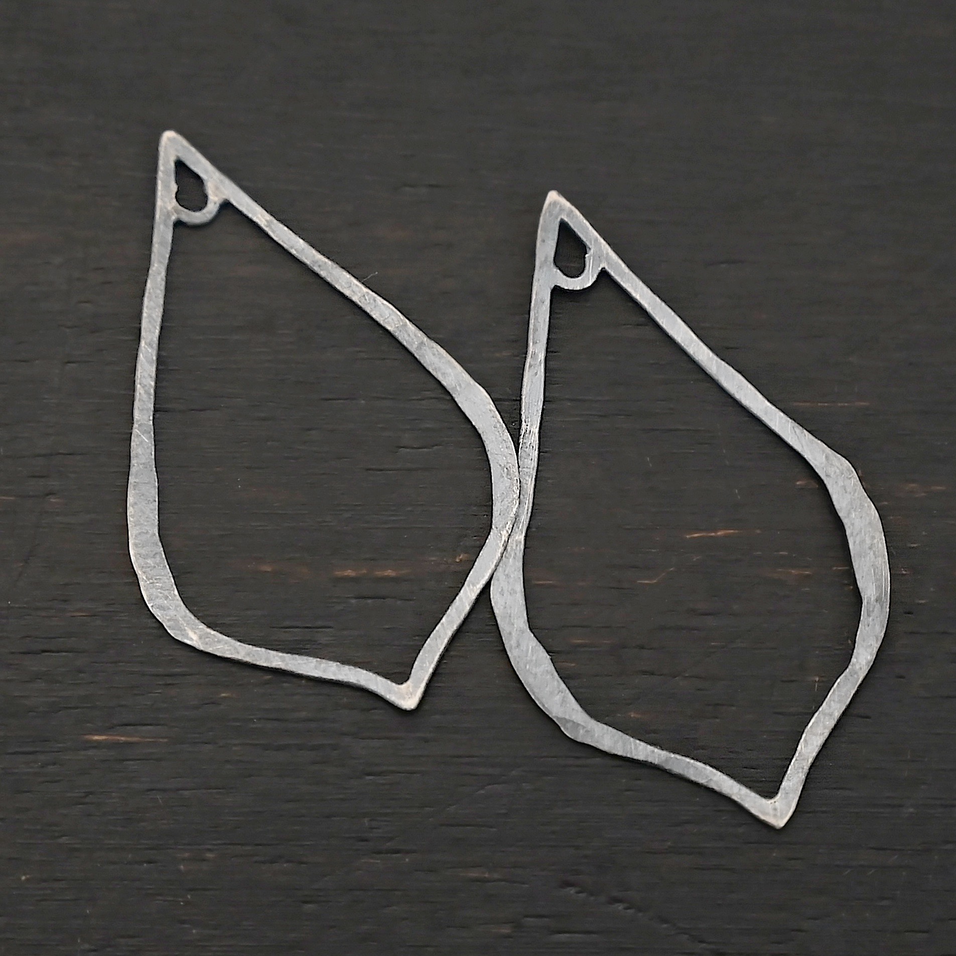 Sterling Silver Tula Petal Teardrop Chandelier oxidized hammered shown on dark background