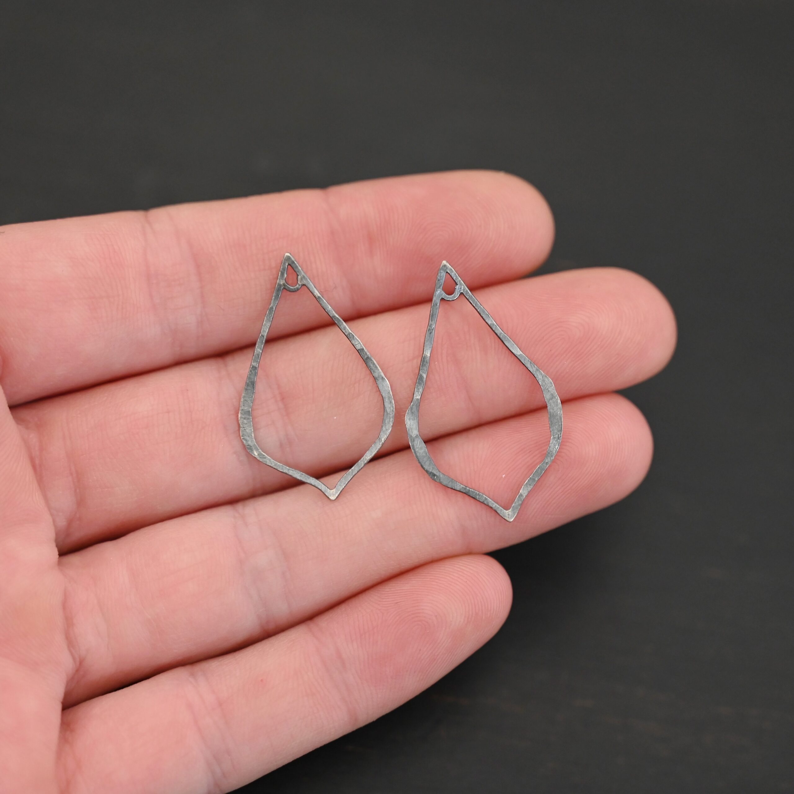 Sterling Silver Tula Petal Teardrop Chandelier oxidized hammered shown in hand