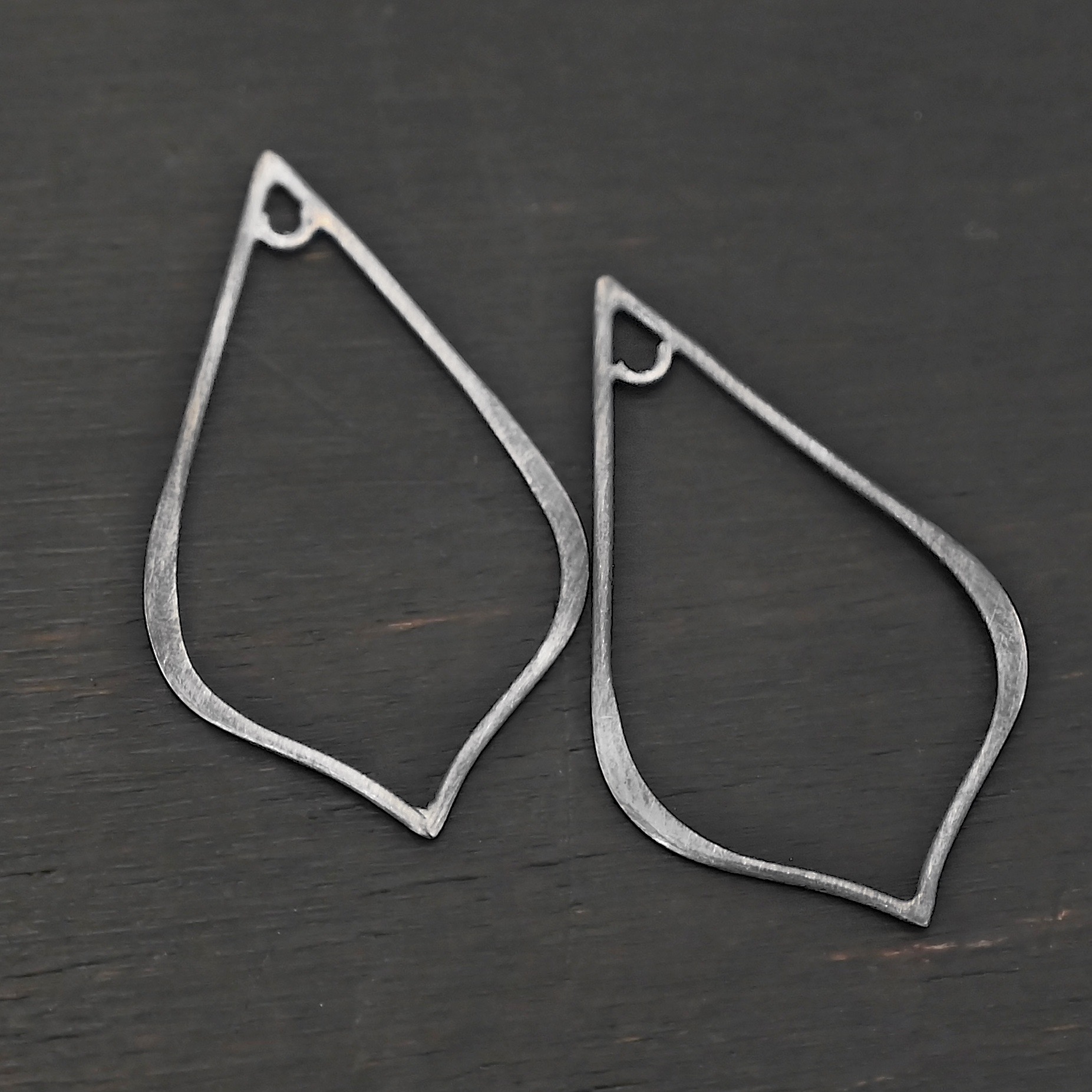 Sterling Silver Tula Petal Teardrop Chandelier oxidized smooth shown on dark background