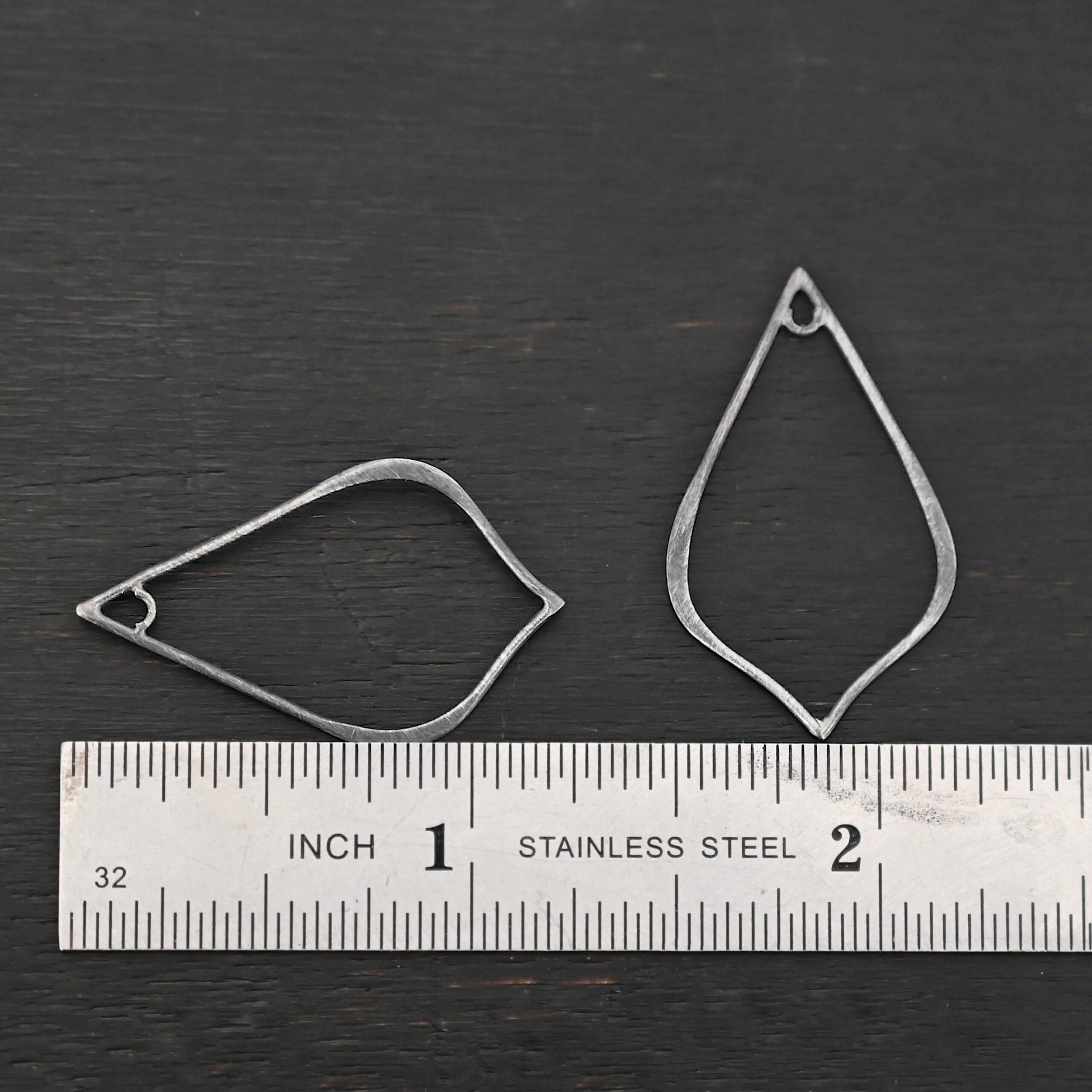 Sterling Silver Tula Petal Teardrop Chandelier oxidized smooth shown by ruler