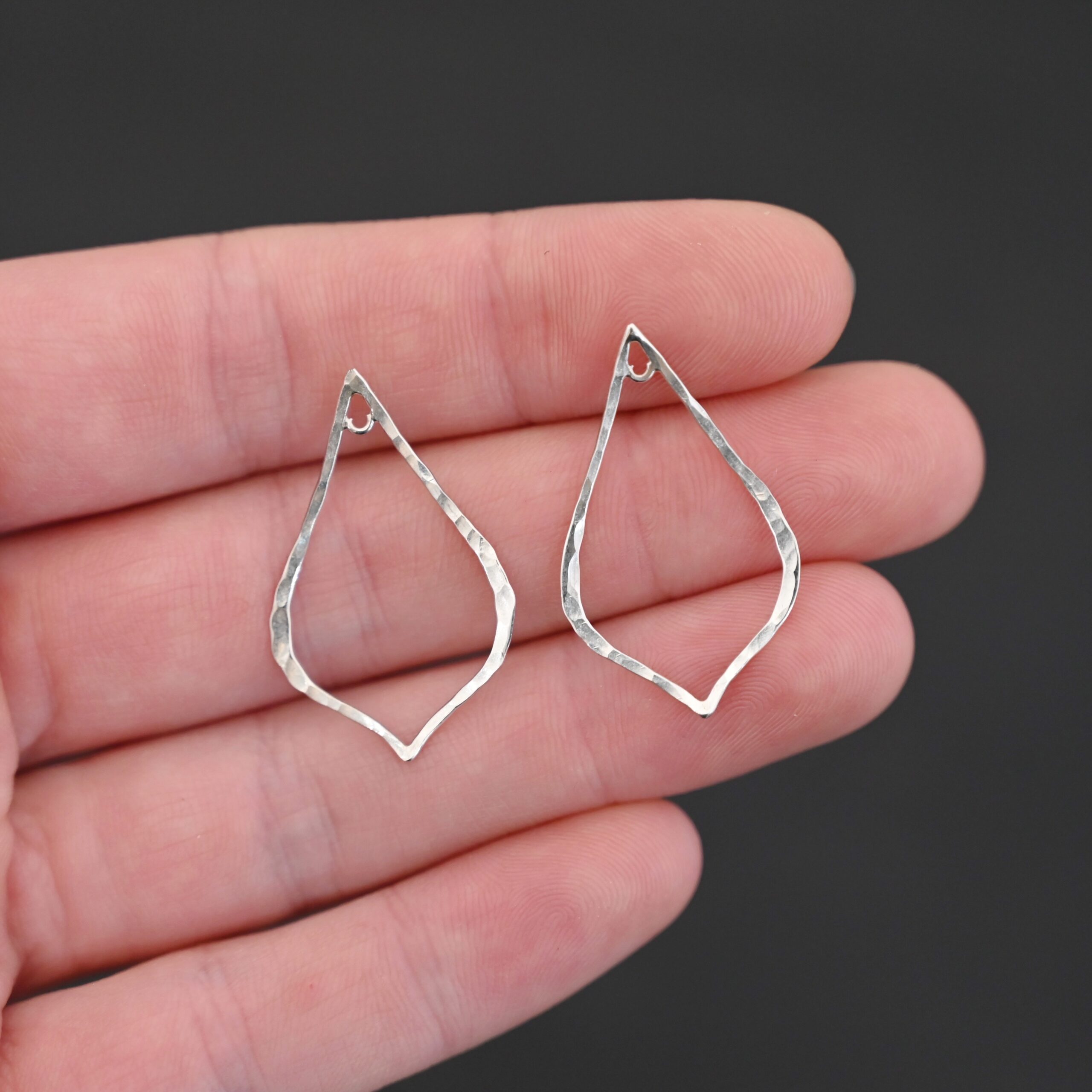 Sterling Silver Tula Petal Teardrop Chandelier shiny hammered shown in hand