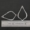 Sterling Silver Tula Petal Teardrop Chandelier shiny hammered shown by ruler