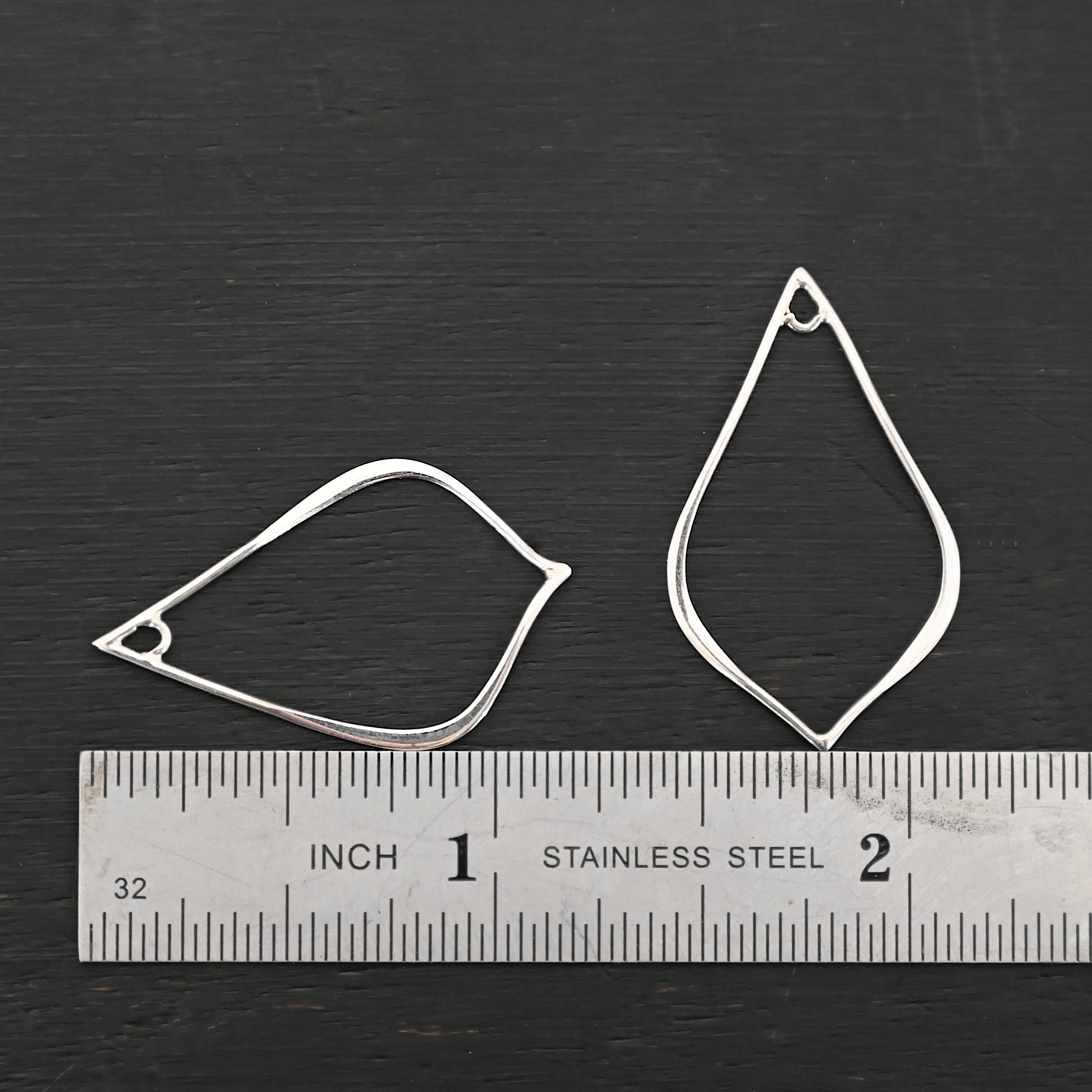 Sterling Silver Tula Petal Teardrop Chandelier shiny smooth shown by ruler