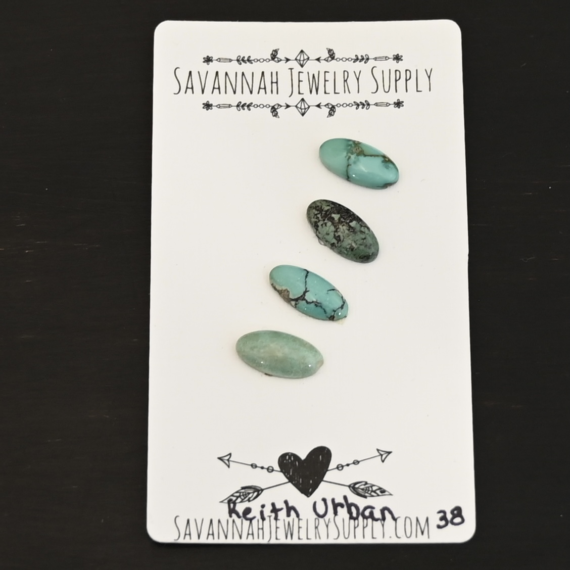 Keith Urban Turquoise Cabochon Parcel shown on business card