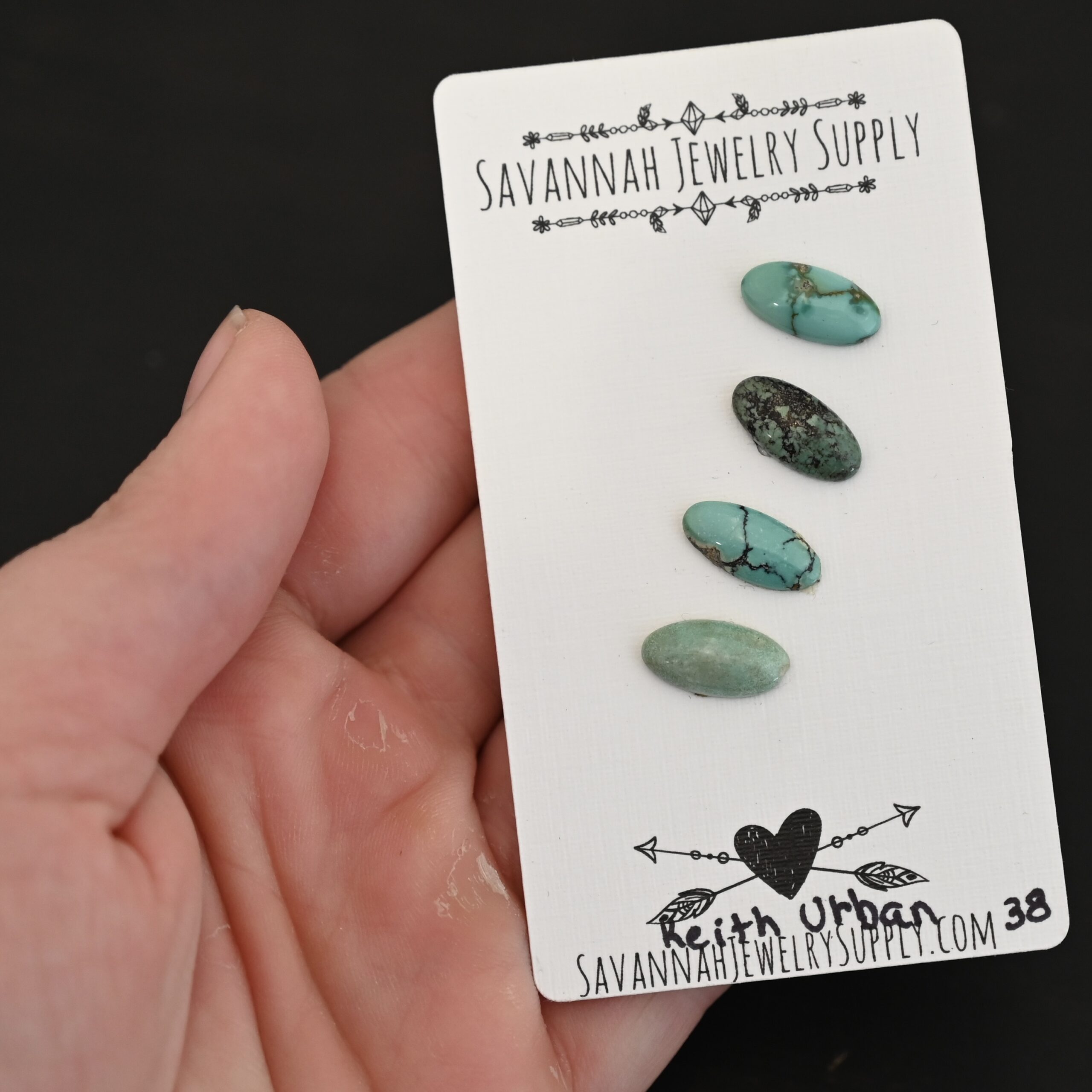 Keith Urban Turquoise Cabochon Parcel shown in hand