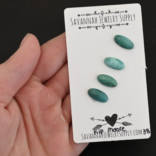 Kip Moore Turquoise Cabochon Parcel shown in hand