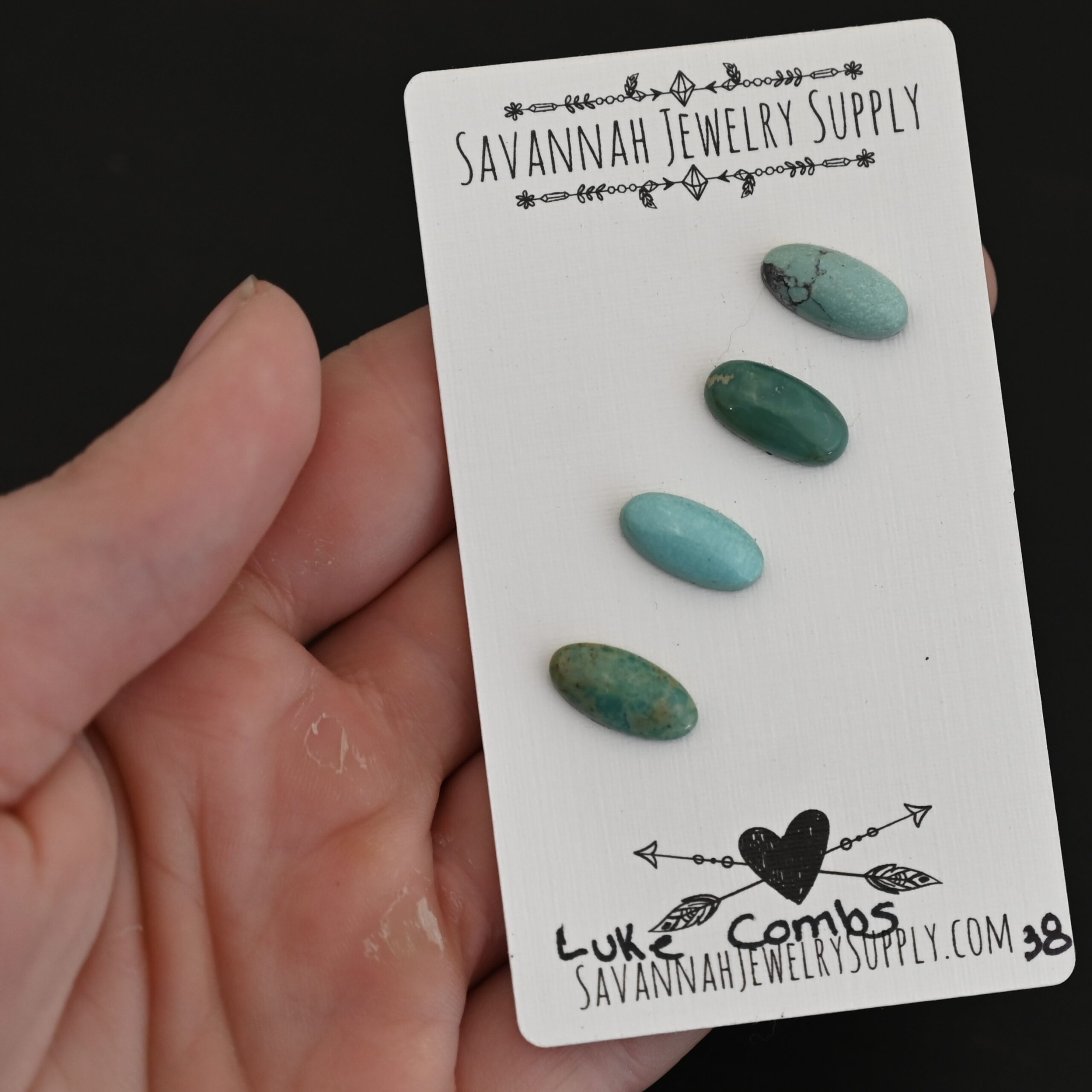 Luke Combs Turquoise Cabochon Parcel shown in hand