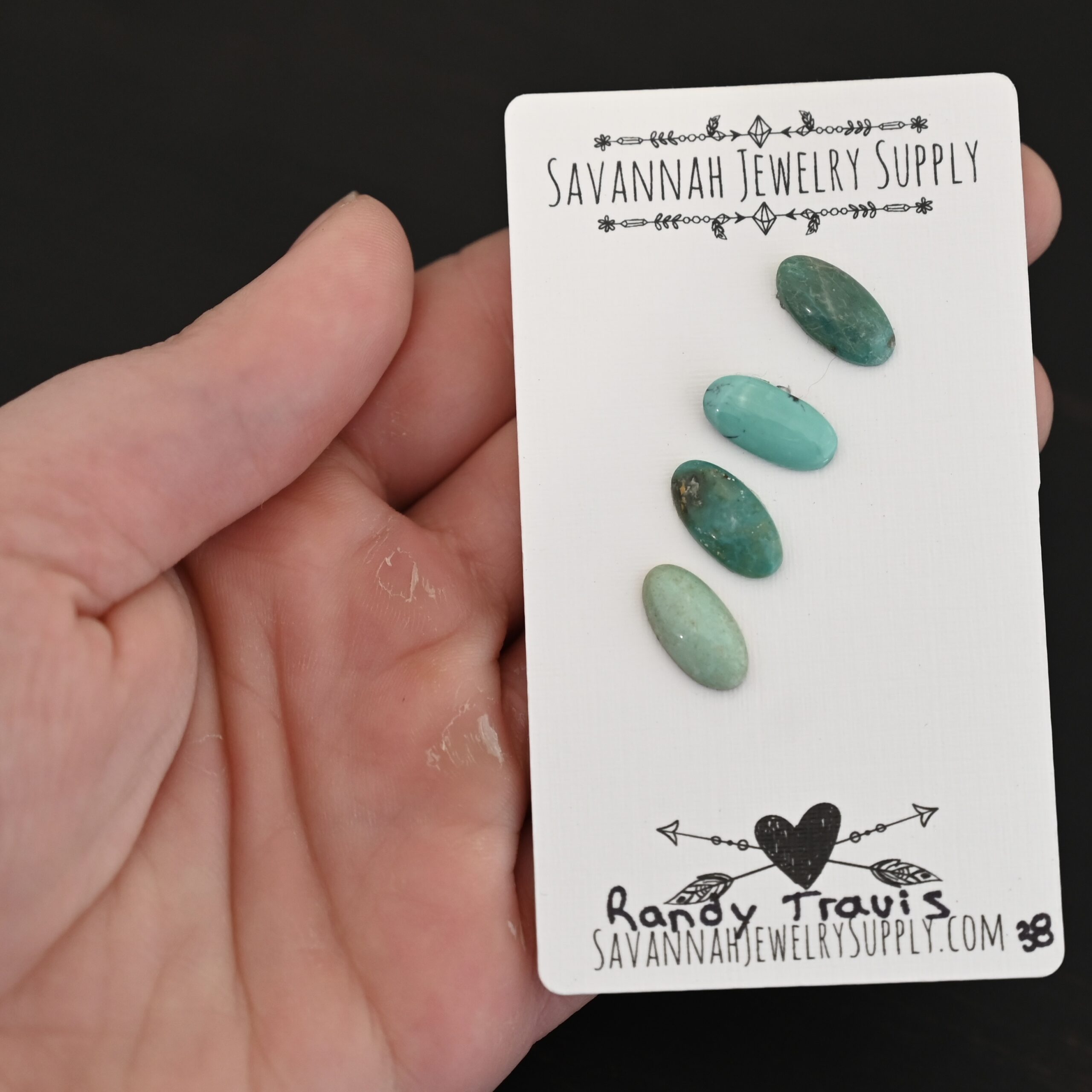 Randy Travis Turquoise Cabochon Parcel shown in hand