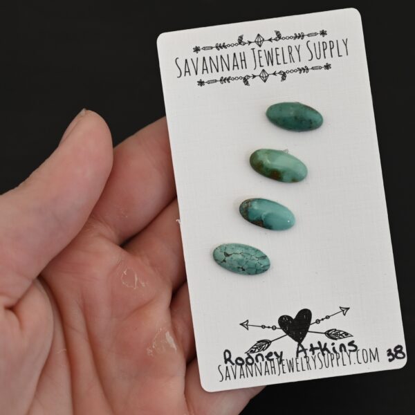 Rodney Atkins Turquoise Cabochon Parcel shown in hand