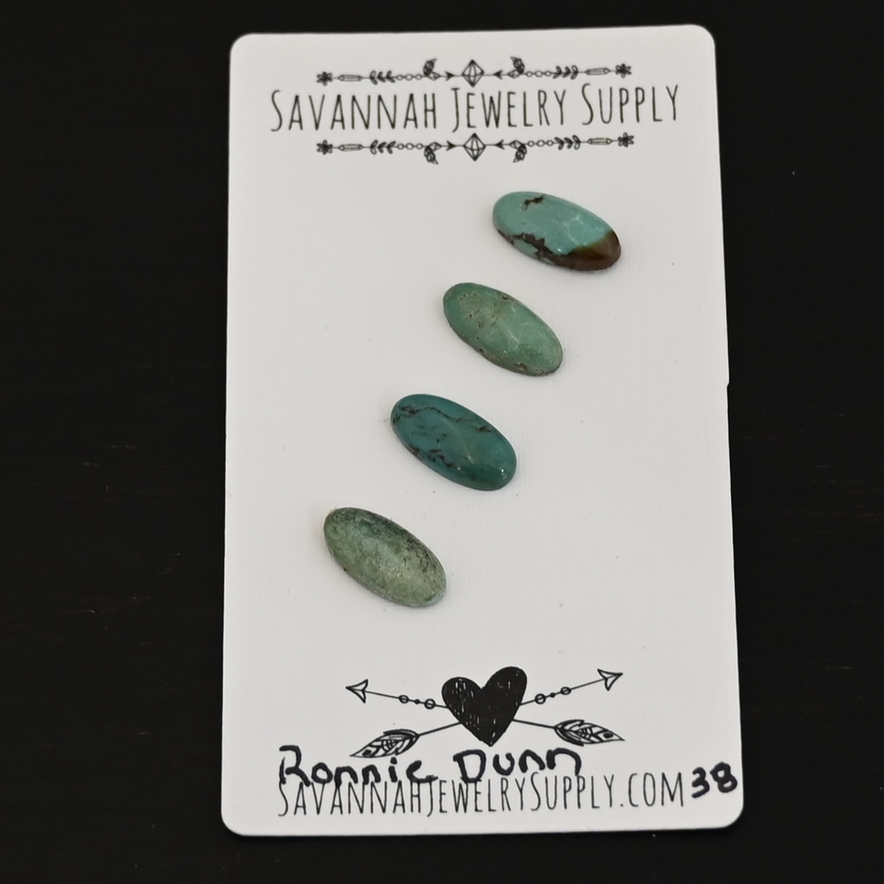 Ronnie Dunn Turquoise Cabochon Parcel shown on business card