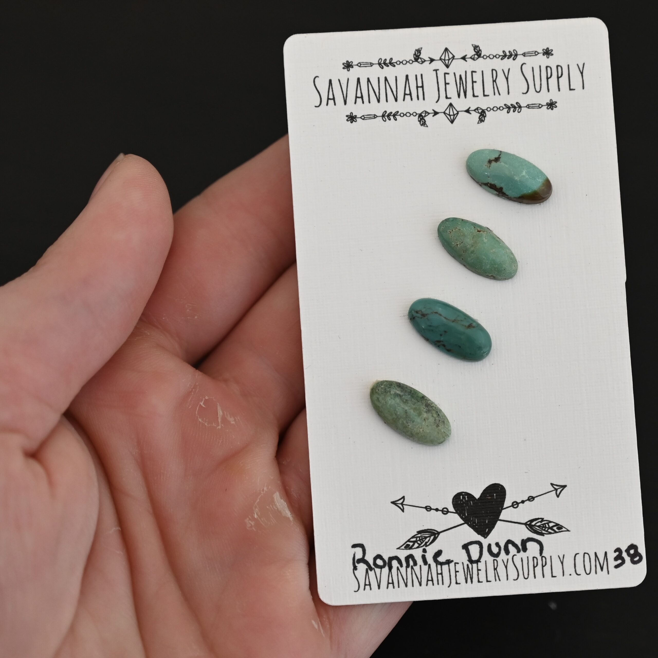 Ronnie Dunn Turquoise Cabochon Parcel shown in hand