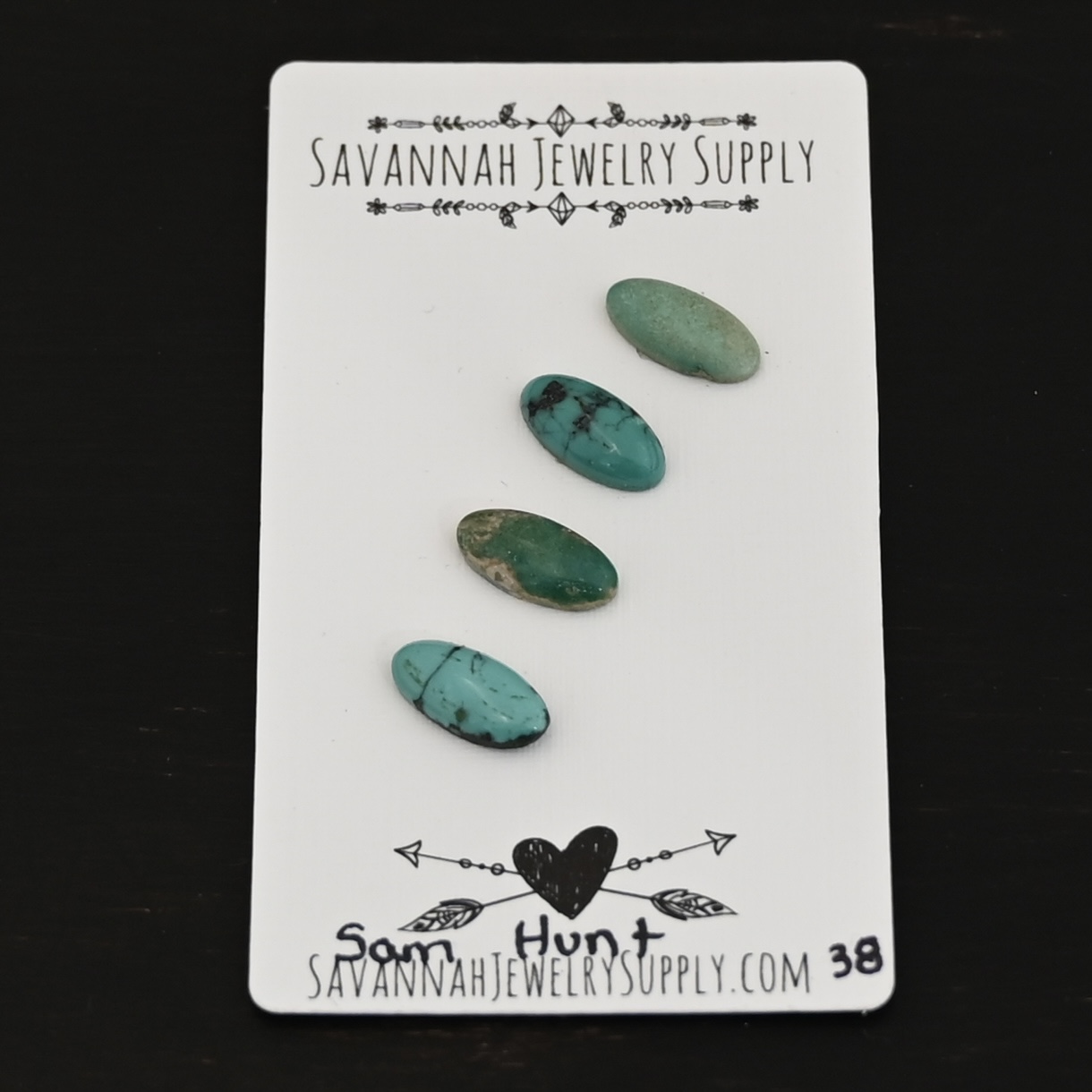 Sam Hunt Turquoise Cabochon Parcel shown on business card