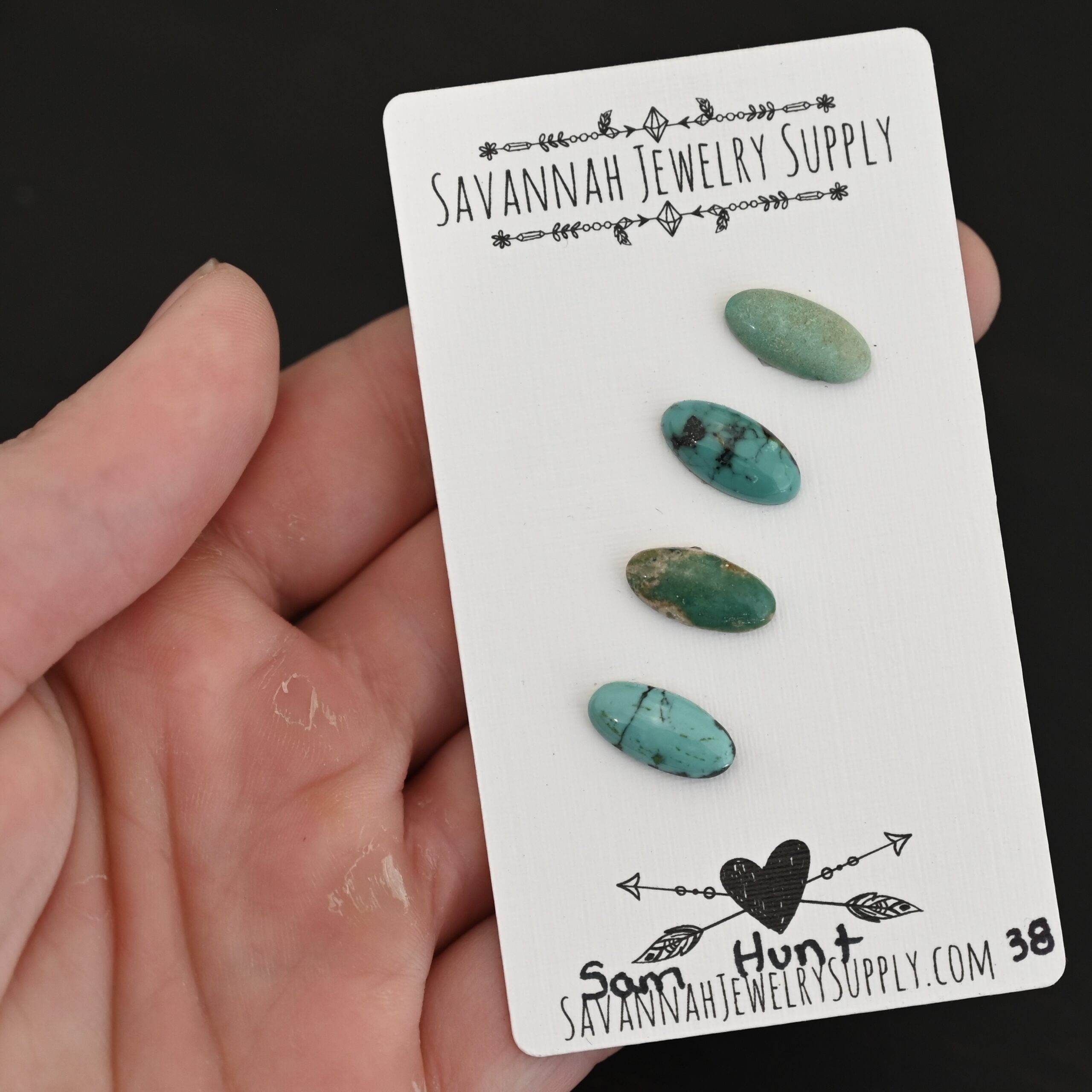 Sam Hunt Turquoise Cabochon Parcel shown in hand