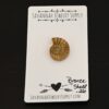 Bronze Shell Cabochon shown on business card