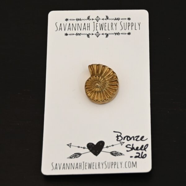 Bronze Shell Cabochon shown on business card