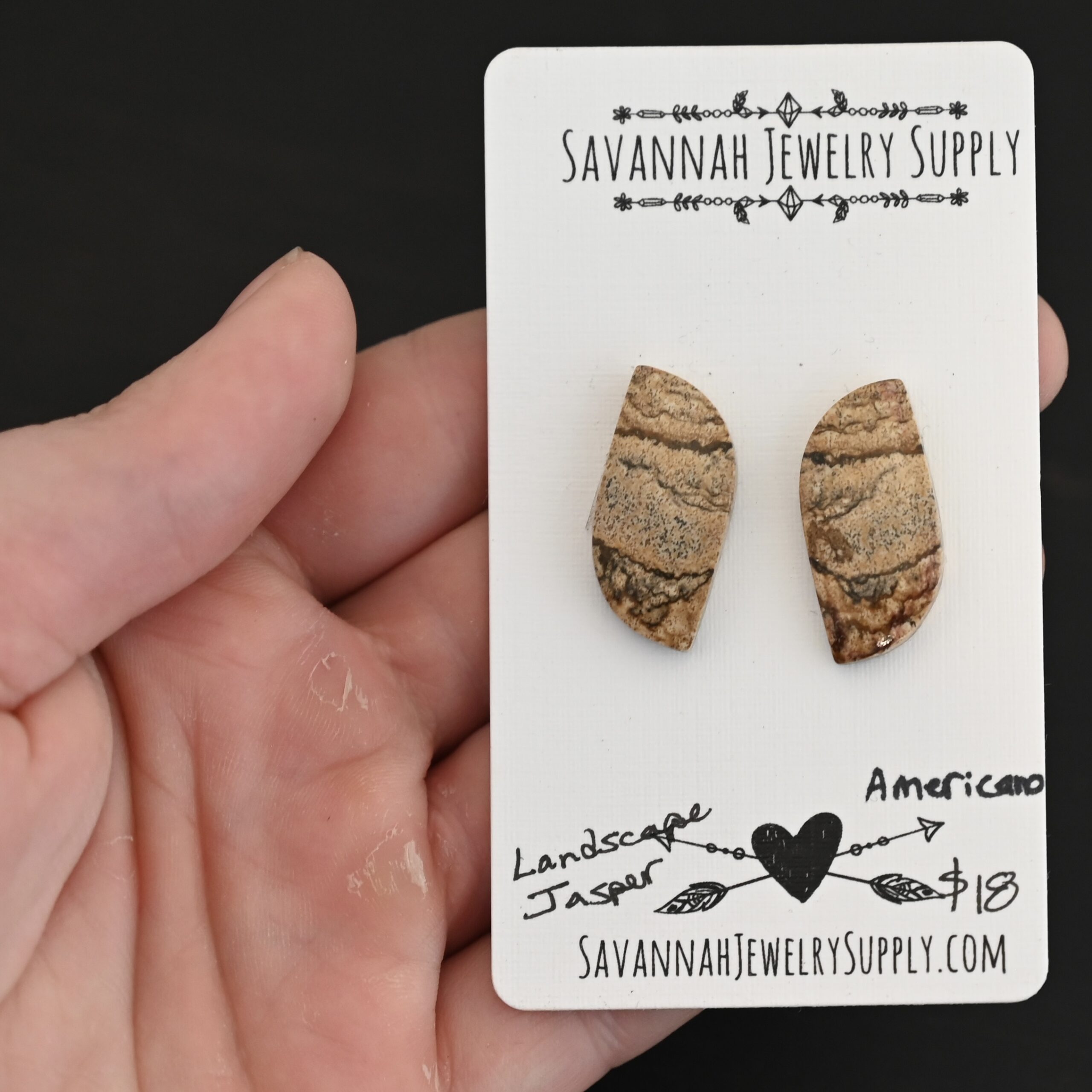 Americano - Landscape Jasper Cabochon Pair shown in hand