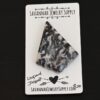 Leopard Jasper Cabochon shown on business card