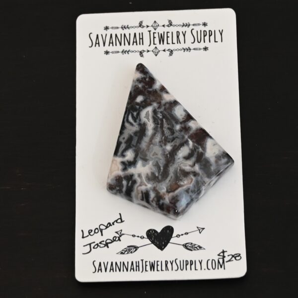 Leopard Jasper Cabochon shown on business card
