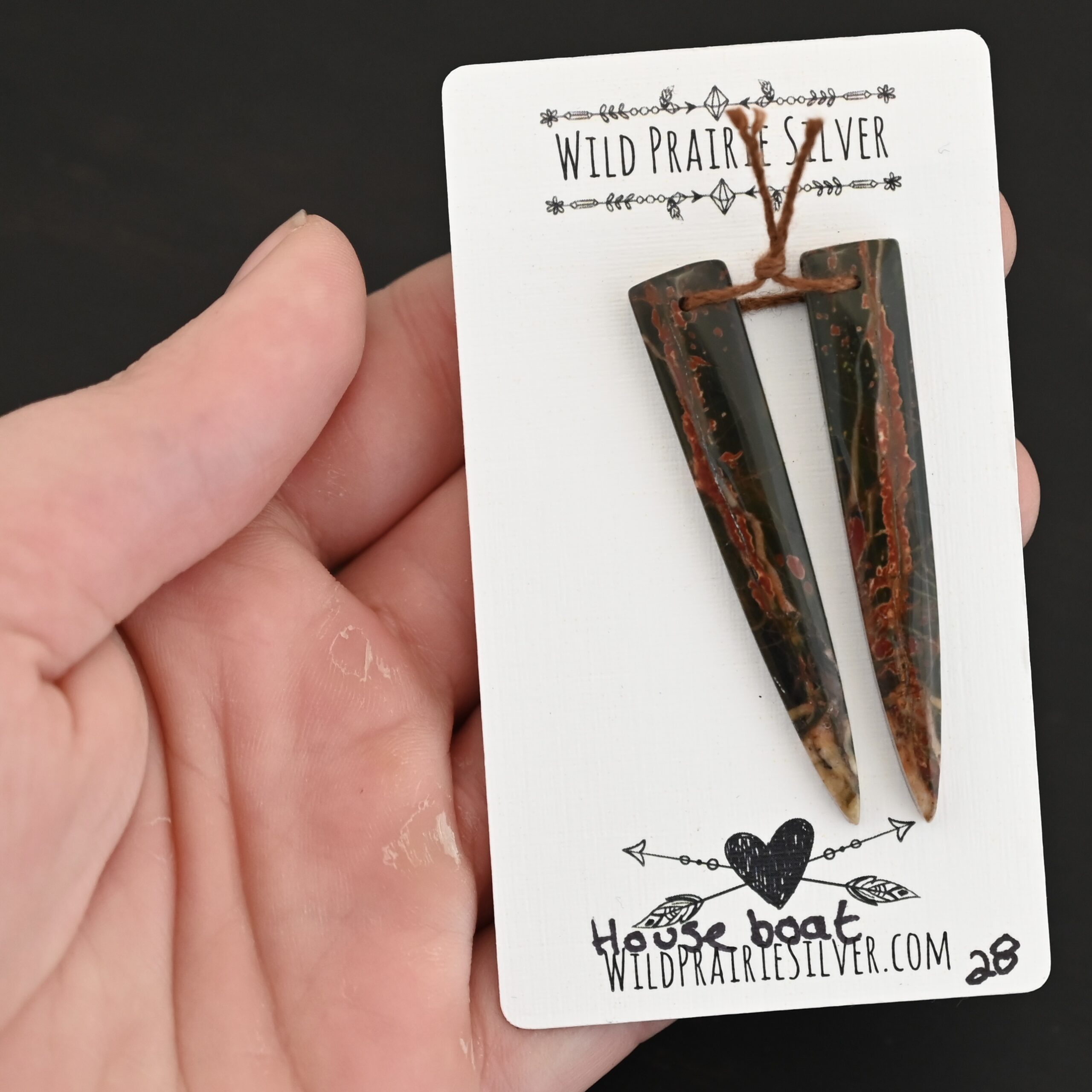 House Boat - Drilled Jasper Pair shown in hand