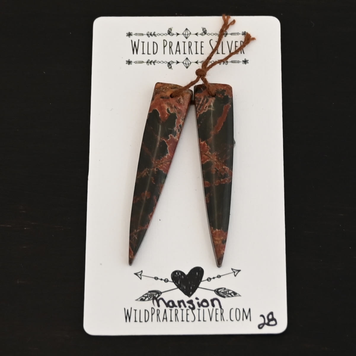 Mansion - Drilled Jasper Pair shown on business card