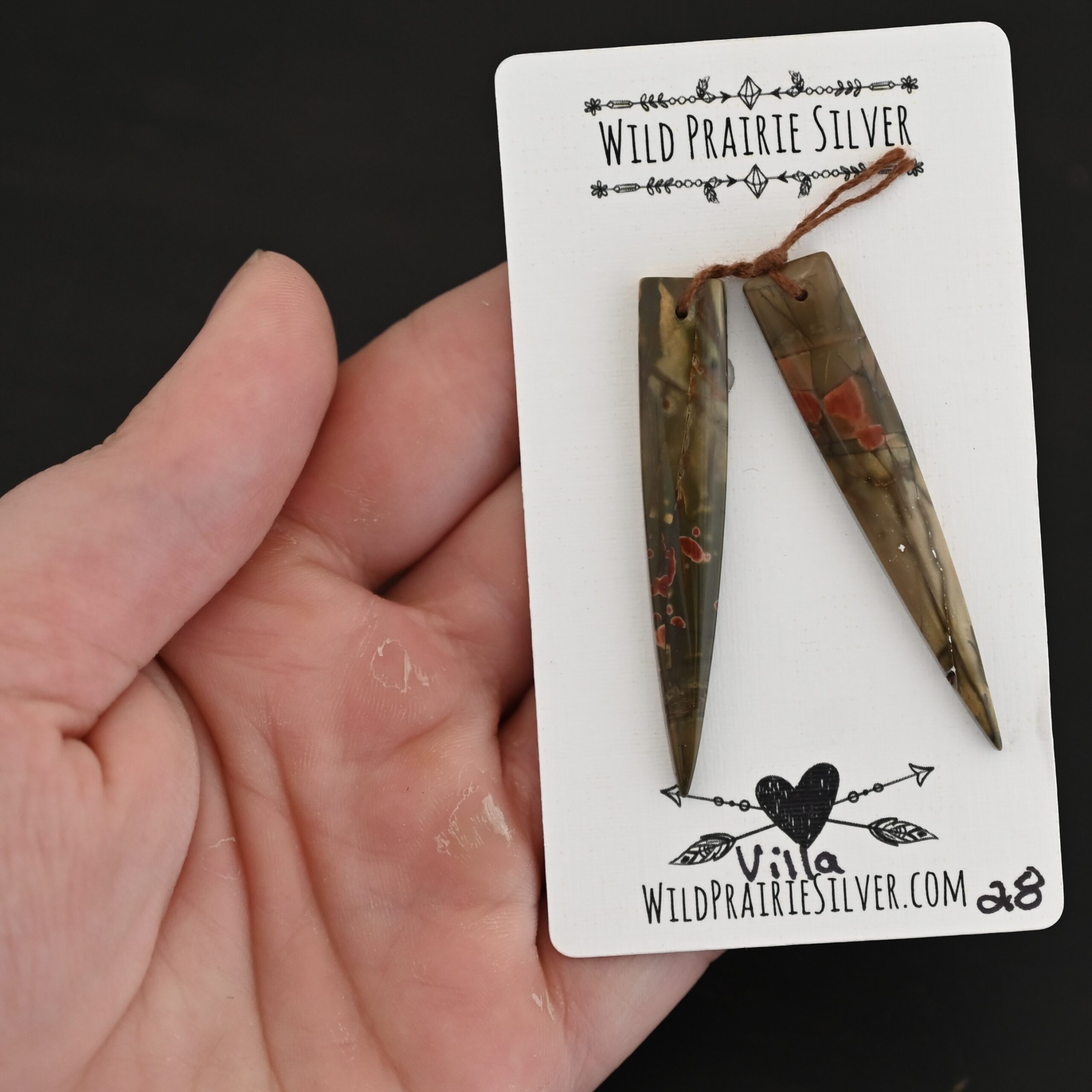 Villa - Drilled Jasper Pair shown in hand