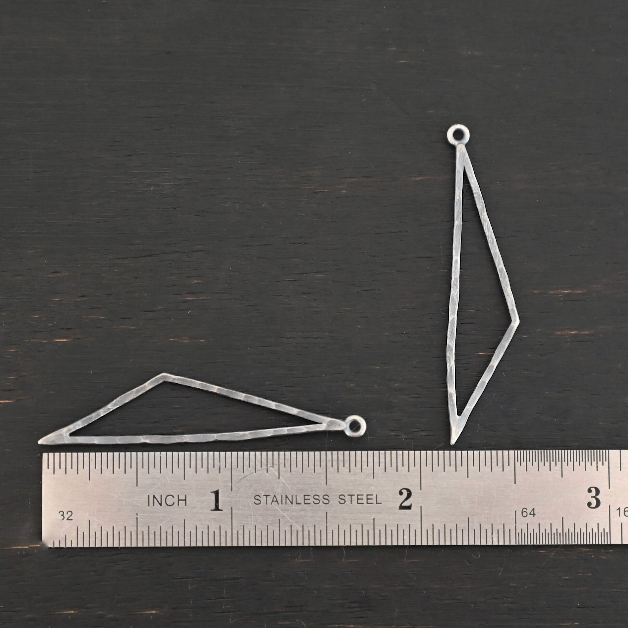 sterling silver Trace Triangle Chandelier 43x8.5mm oxidized hammered shown by ruler