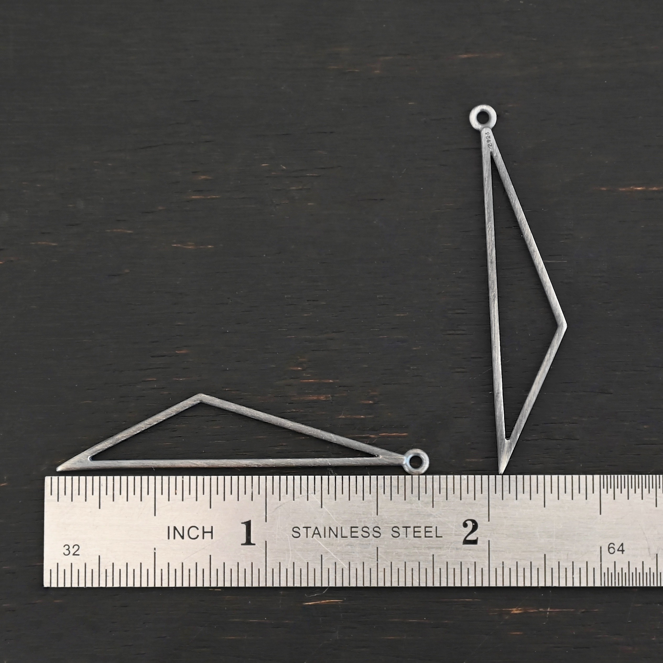 sterling silver Trace Triangle Chandelier 43x8.5mm oxidized smooth shown by ruler